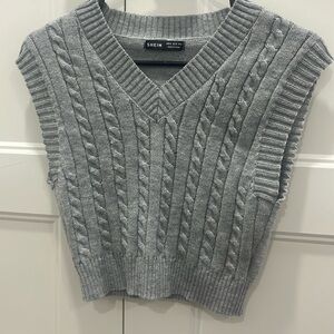 Gray sweater vest